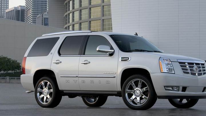 Side Pose Of 2009 Cadillac Escalade Hybrid in White